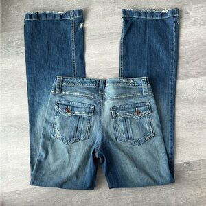 Vintage Canada blue denim jeans with distressed details by Second